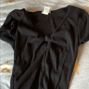 A cropped black shirt